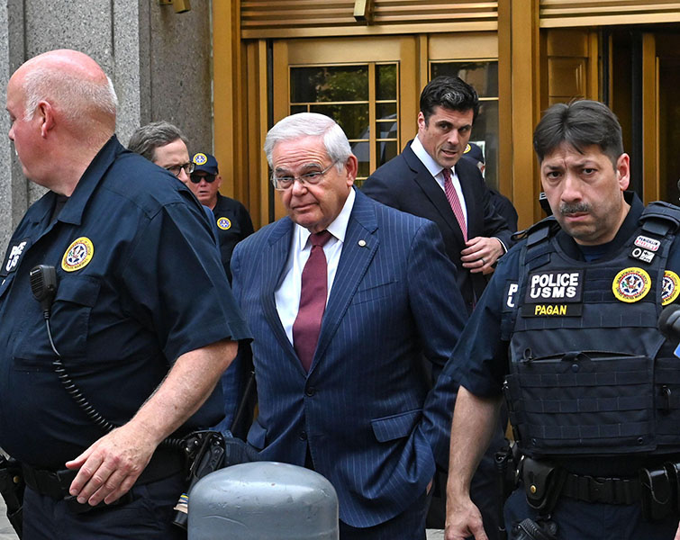 Photo of former US Senator Bob Menendez leaving courtroom in police custody